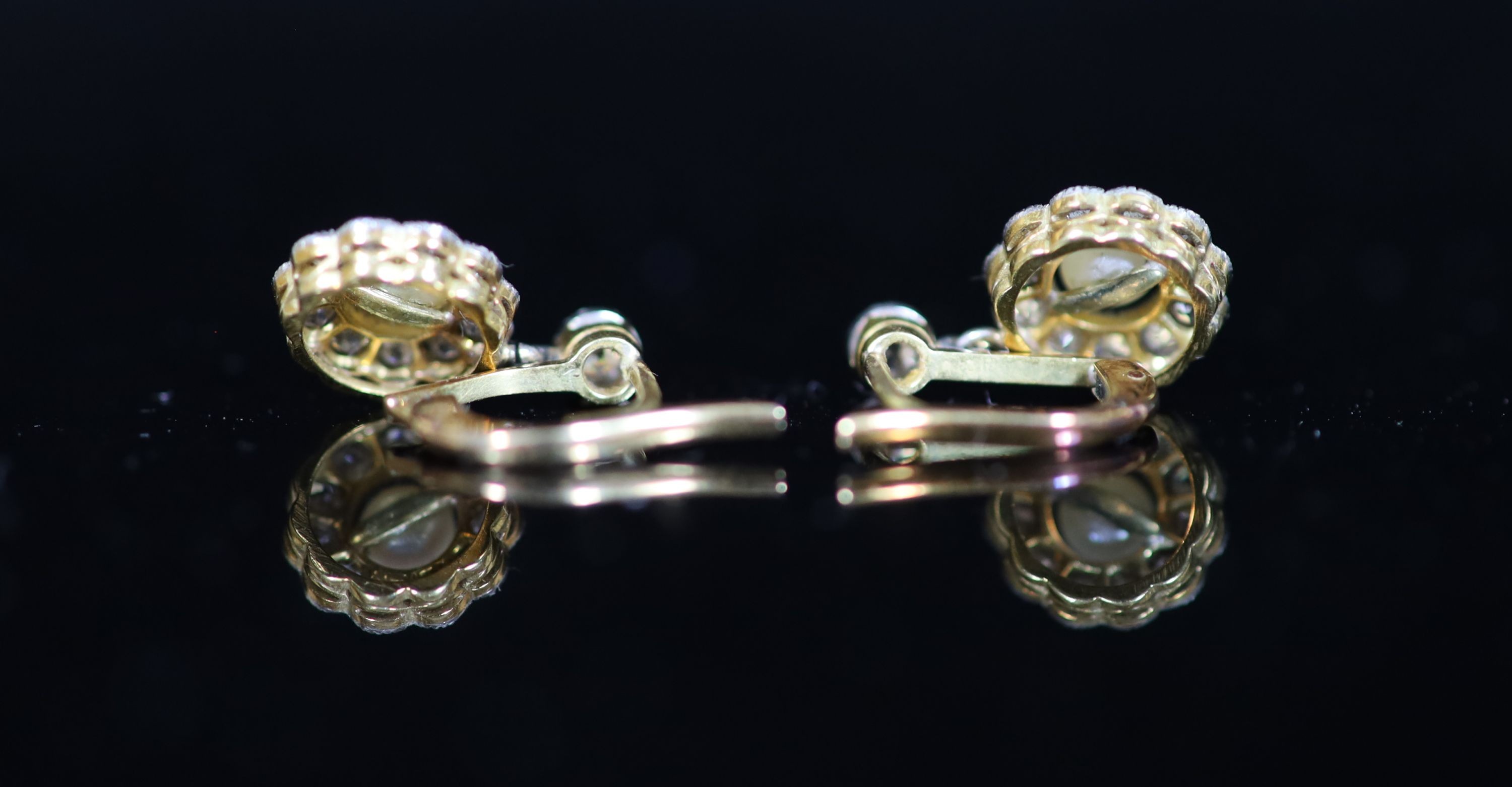 A pair of antique gold, pearl and diamond set circular cluster drop earrings